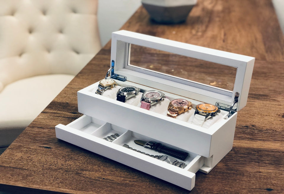 White Caywood Collector's Box displayed on a tabletop featuring Abingdon watches