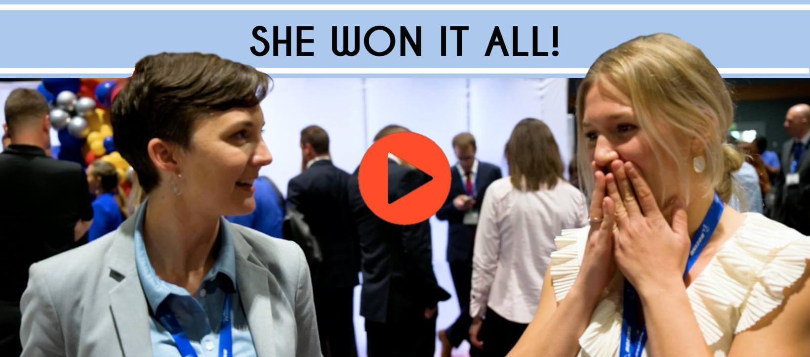 Abingdon Co. Image displays Video Thumbnail for a YouTube Episode on what it's like to win the scholarship.  Two women standing at an event and the younger one has her hands up to her mouth in surprise