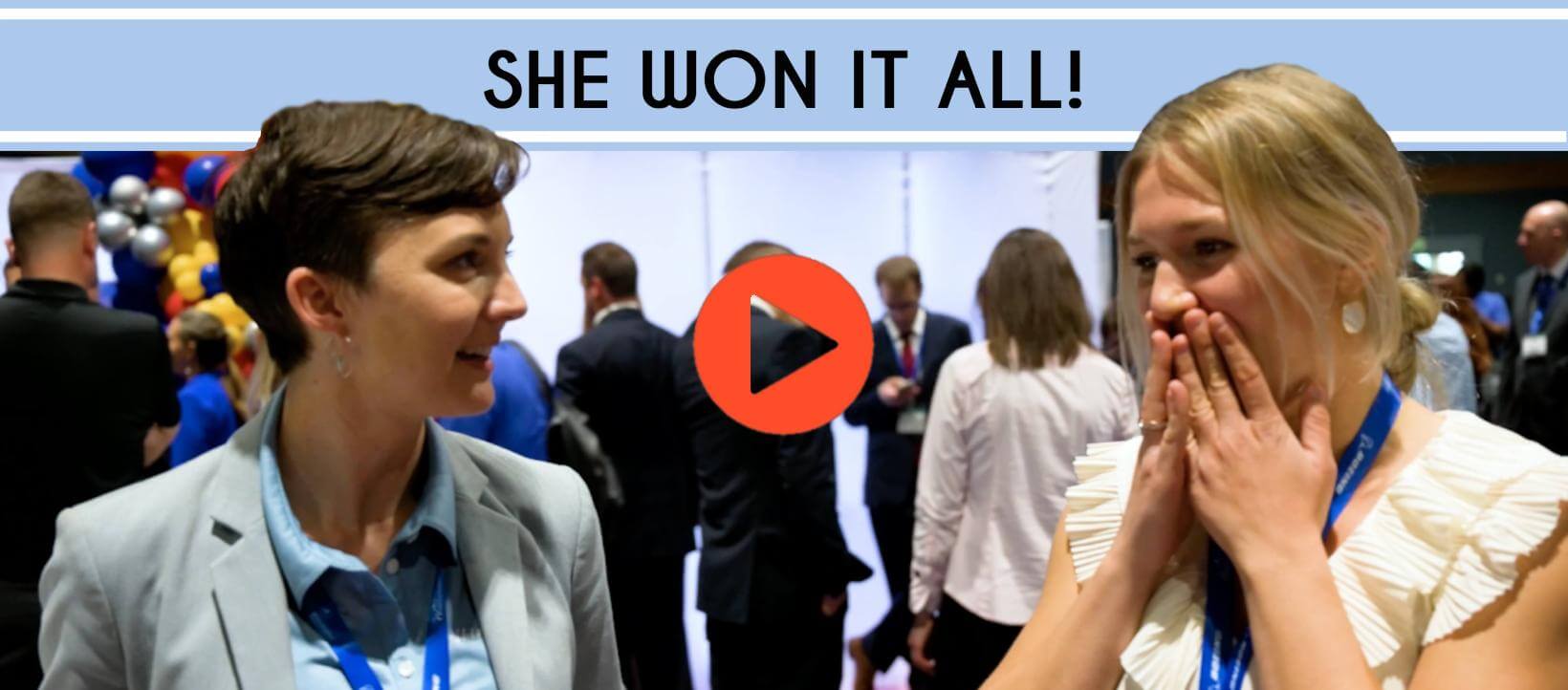 Abingdon Co. Image displays Video Thumbnail for a YouTube Episode on what it's like to win the scholarship. Two women standing at an event and the younger one has her hands up to her mouth in surprise
