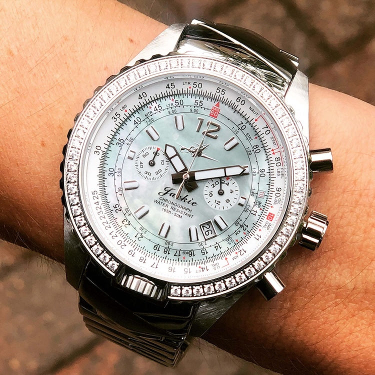 Abingdon Co Jackie luxury watch with detailed face on a wrist against a blurred background