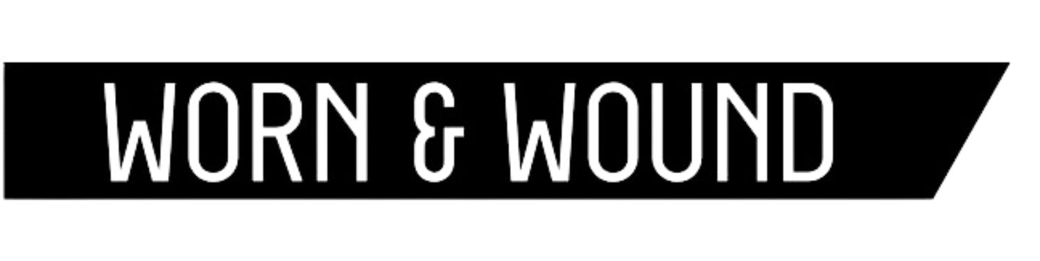 Black banner with 'Worn & Wound' text in white