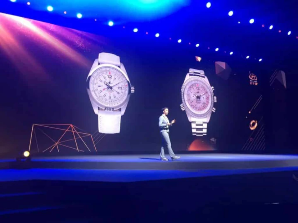 Abingdon Co. A image displaying CEO and Founder, Abingdon Mullin, speaking on stage at an event about the watch business